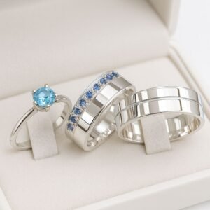 alianças e anel solitário